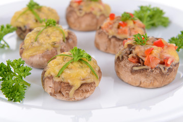 Stuffed mushrooms on plate close-up