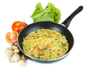 Omelet with vegetables isolated on white