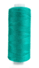 Colored spool of thread isolated on white