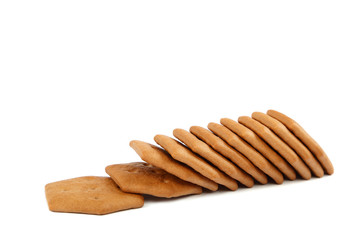 Stack of cracker biscuits isolated on a white background.