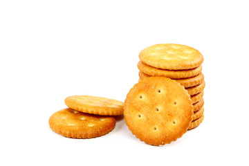 Stack of cracker biscuits on a white background.