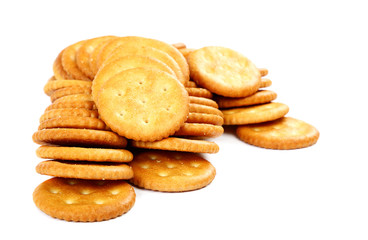 Stack of cracker biscuits on a white background.