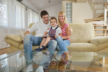 family at home using tablet computer