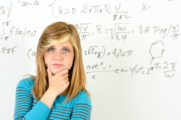 Desperate student girl front of maths board