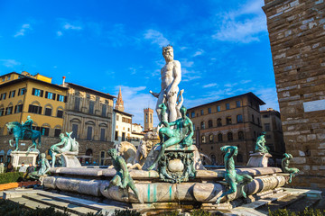 Famous Fountain of Neptune on Piazza della Signoria in Florence, - obrazy, fototapety, plakaty