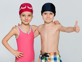 Two children in swimsuits