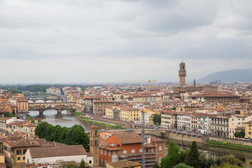 Fototapeta na wymiar Bell Tower Over Florence with Arno River