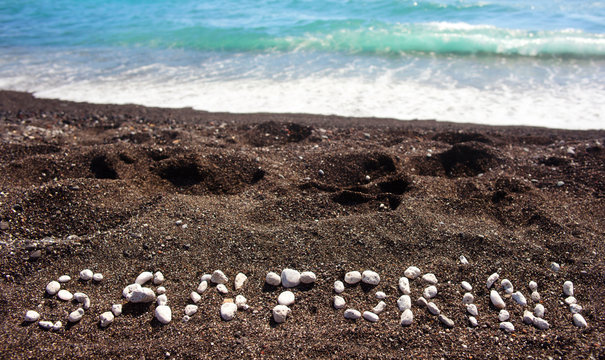 Text Santorini made ​​with pumice stones