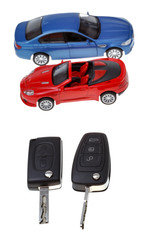 Fototapeta premium two vehicle keys and model cars