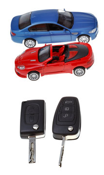 two vehicle keys and model cars