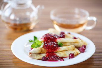 pancakes with jam and berries
