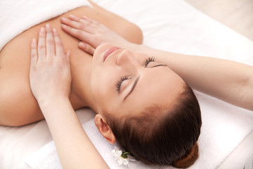 Obraz na płótnie Canvas Enjoying massage at spa.