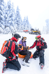 Ski patrol team rescue woman broken arm
