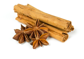star anise and ceylon cinnamon sticks isolated on white