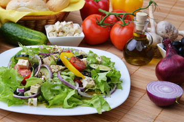Obraz na płótnie Canvas salad with fresh vegetables