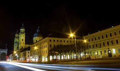 Fototapeta na wymiar munich street and the Theatiner church at night