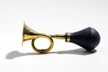 Old brass trumpet or car horn