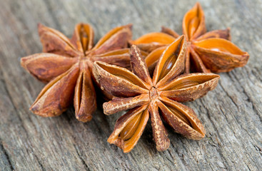 star anise on wooden surface