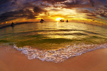 Tropical beach at sunset