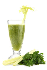Glass of green vegetable juice and celery isolated on white