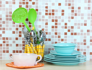 Dishes and cutlery in kitchen