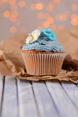 Tasty cupcake with butter cream,