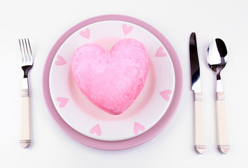 Heart on plate, isolated on white