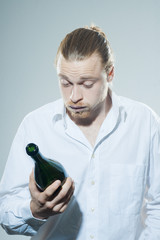 young man drinking alkohol