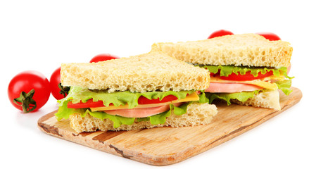 Fresh and tasty sandwiches on cutting board isolated on white