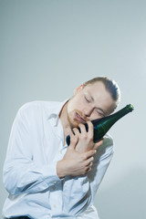 young man drinking alkohol