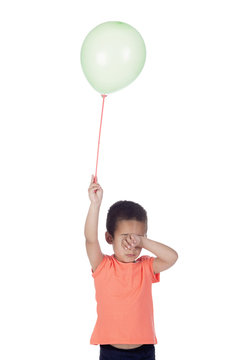 little boy with orange  shirt