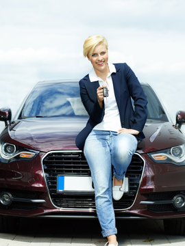 Woman Proudly Presents The Key Of Her Car