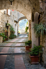 Fototapeta na wymiar ancient stone street in Liguria, Italy