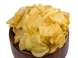 potato chips in a wooden bowl isolated on white background