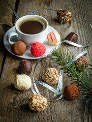 Luxury chocolate candies and cup of coffee