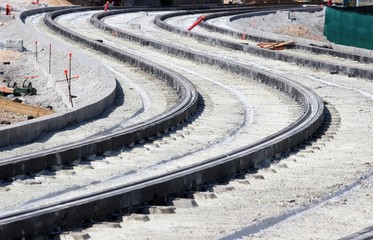 Premières couches de béton de calage sur voies tramway
