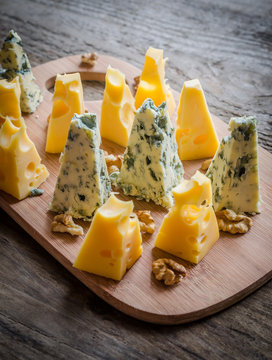 Pieces of emmental and blue cheese