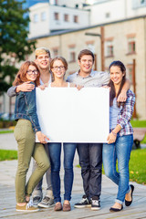 Obraz premium students or teenagers with white blank board
