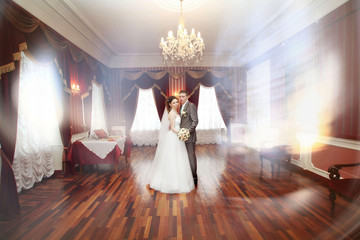 bride and groom in the old interior