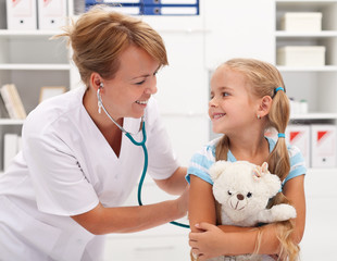 Little girl at the doctor for a checkup examination