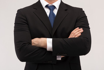 Obraz na płótnie Canvas close up of buisnessman in suit and tie