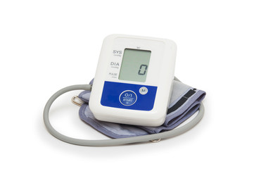 Digital blood pressure meter on white background