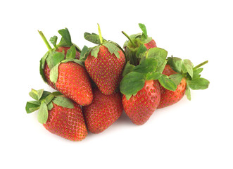Heap of ripe appetizing red strawberry isolated closeup