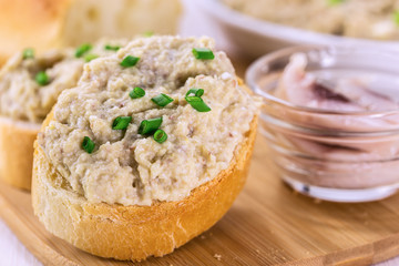 Slice of toasted baguette with creamy pate