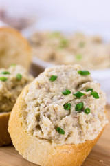 Slice of toasted baguette with creamy pate