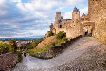 Obraz premium La Porte De Aude and street at late afternoon in Carcassonn