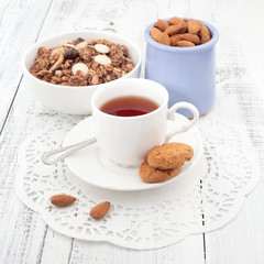 Breakfast with homemade cookies, oat and almond with cup of tea