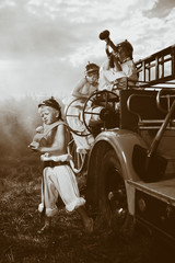 Fototapeta premium Stylish group of young retro firemen