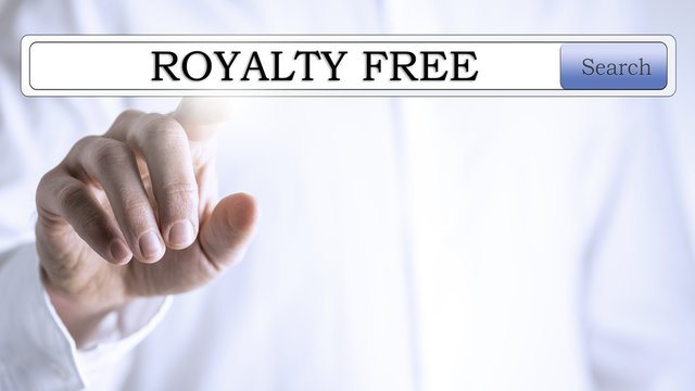 Finger on 'royalty free' written in the search bar