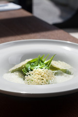 Image of tasty green dumplings with spinach on table